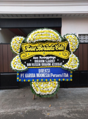 Papan Bunga Duka di Bumi Kedamaian